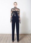 High-necked jumpsuit with long sleeves made of couture lace